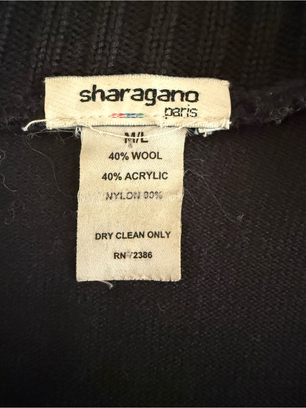 Sharagano Black Zip-front Knit Jacket with fur panels and black gloves